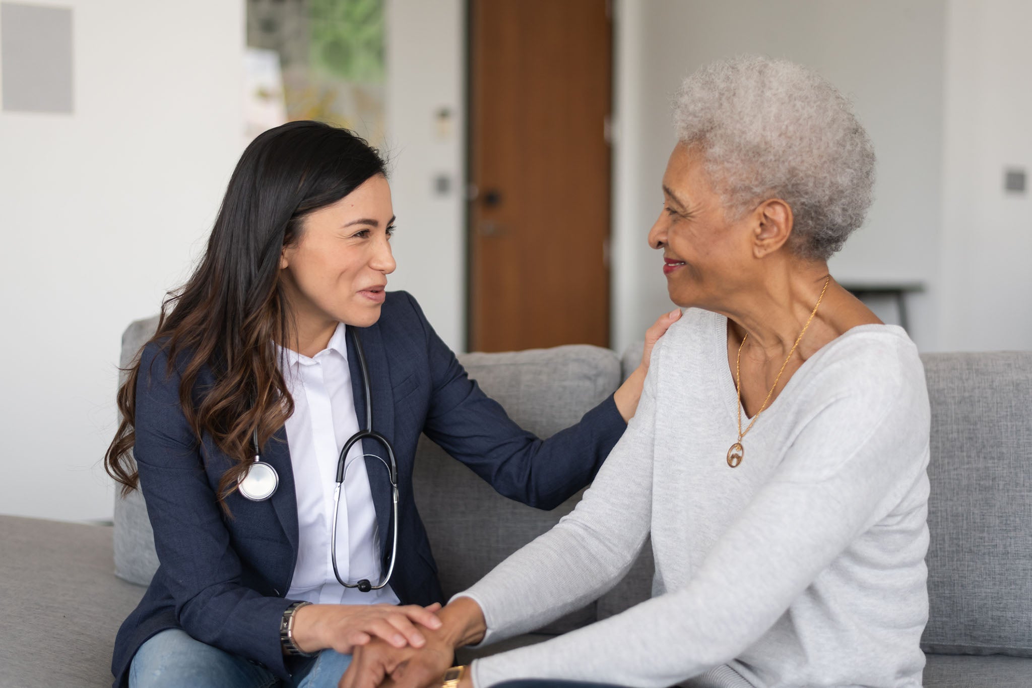 woman talking to doctor